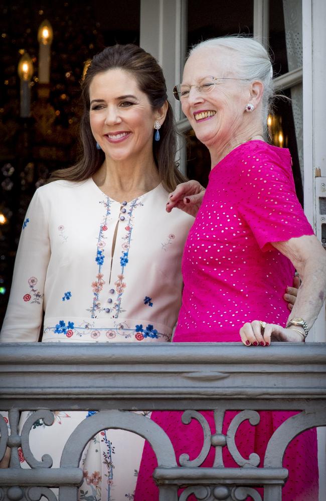 Queen Margrethe of Denmark and Crown Princess Mary of Denmark appear on the balcony of Amalienborg Palace in 2018. Picture: Patrick van Katwijk