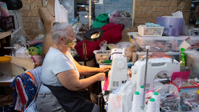 Mend and Make Do Crew volunteer Georgina Mackenzie-Green gets busy with some mask sewing.