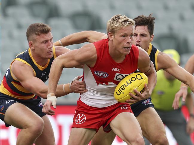 AFL - Adelaide Crows v Sydney Swans at the Adelaide Oval. Isaac Heeney under pressure from Rory Laird and Jake Kelly  Picture SARAH REED
