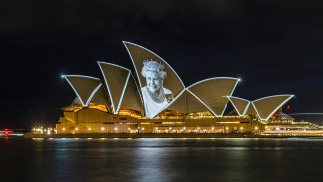 An image of the late Queen Elizabeth II is projected onto the sails of the Sydney Opera House on September 10, 2022. She made six visits to the Opera House in her lifetime, the most recent in 2006. Picture: Jenny Evans/Getty Images