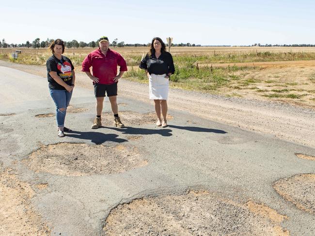 Roads Opposition roads spokeswoman Roma Britnell (right) met with concerned farmers Sharon and Russell Hocking along the Prairie-Rochester Road. The road is one of many damaged by the 2022 floods and is significantly potholed. Picture: Zoe Phillips