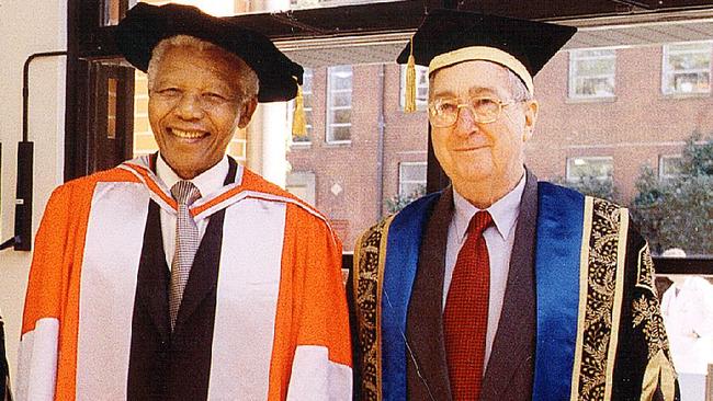 Nelson Mandela with Sir Gerard Brennan in 2000. Picture: Supplied