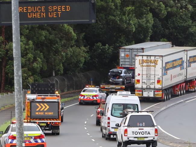 Two trucks in the space of a few hours broke down after losing traction on the wet road surface.