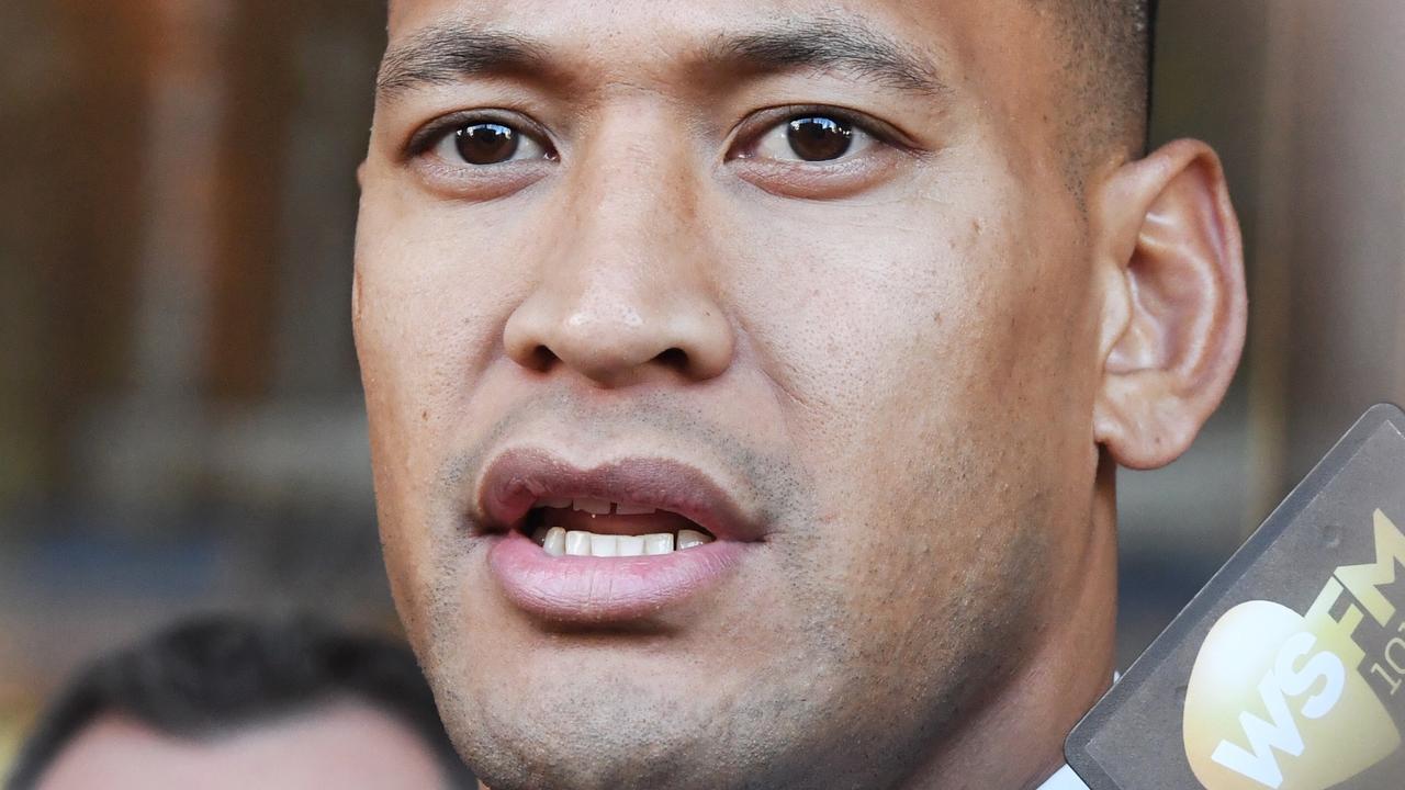 Israel Folau leaves a conciliation hearing at the Fair Work Commission in Sydney on Friday. Picture: AAP Image/Peter Rae.