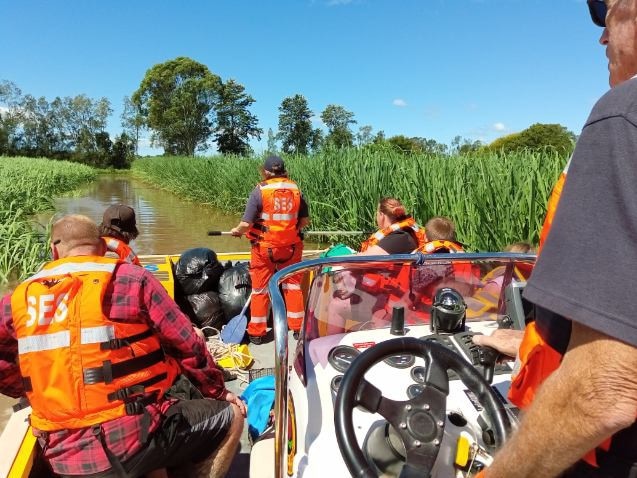 Members of the Corindi-Woolgoolga State Emergency Service Unit put their hand up to help their Grafton colleagues onWednesday.The team was tasked to evacuate a family from a property near Lawrence. The location of the house was some 500 m from the river in cane growing fields. floods.