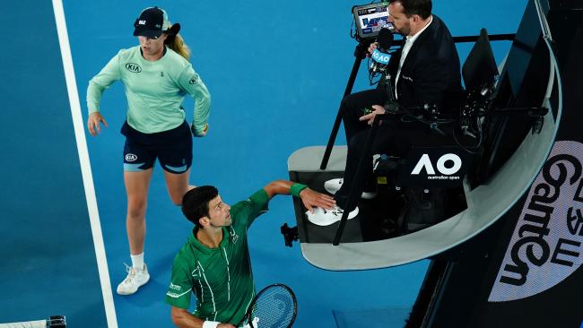 Novak Djokovic grabbed the chair umpire's foot during a mid-match meltdown.