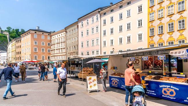 Food stalls at Grunmarkt in Salzburg's Universitatsplatz.