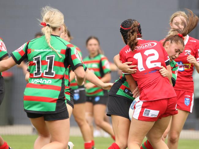 Jayda Lalic is tackled. Photo: Warren Gannon Photography