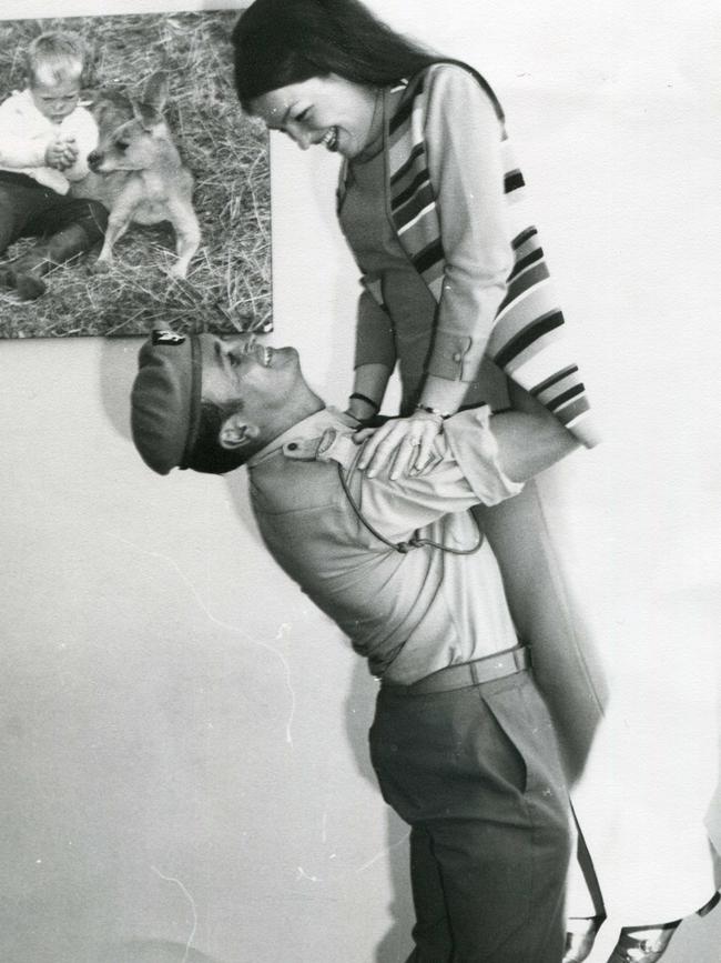 Returning SAS soldier Audie Moldre reunites with his wife Glad at Melbourne Airport in December 1971. Picture: HWT Library