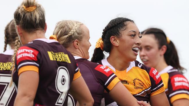 Sara Sautia of the Broncos celebrates the try of Emily Bass (Photo by Ashley Feder/Getty Images)