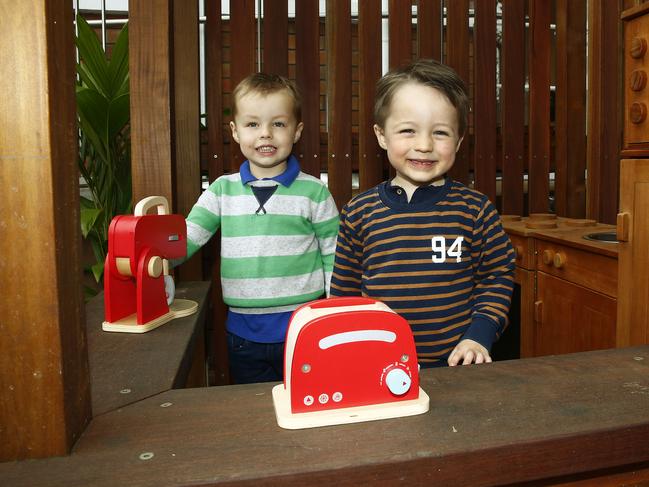 Leo Dever, 3, and Alexander MacGillivary, 3, check out the new cubby house of Woollahra Preschool. Picture: John Appleyard