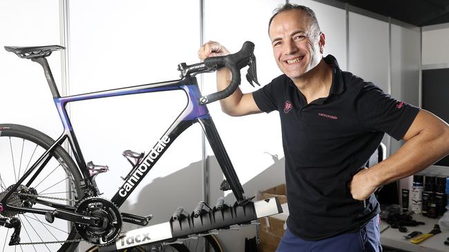 Education First Mechanic Michele Primaro in the Tour Village working on team bikes. Picture: Sarah Reed.