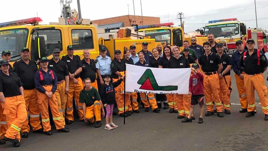 VOLUNTEER: RURAL Fire Service volunteers from around Bundaberg grouped together for the Pageant of Lights. Picture: Contributed