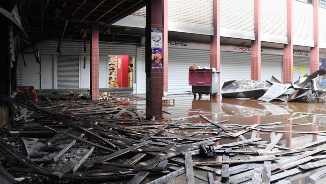 A French kosher grocery store was this month destroyed in an arson attack, after recently being vandalised with swastikas. Picture: AFP Photo / Alain Jocard