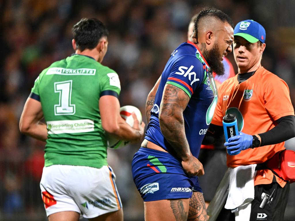 Addin Fonua-Blake of the Warriors is seen by medical staff during the round three NRL match between New Zealand Warriors and Canberra Raiders. (Photo by Kai Schwoerer/Getty Images)