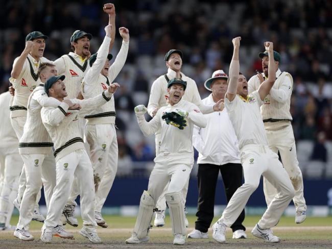 Australia celebrate as one as the Ashes is retained.