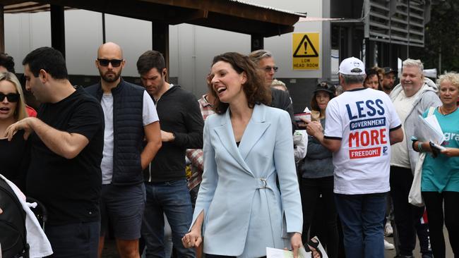 Allegra Spender, the new Independent MP for Wentworth speaks to voters outside Bondi Beach Public School.