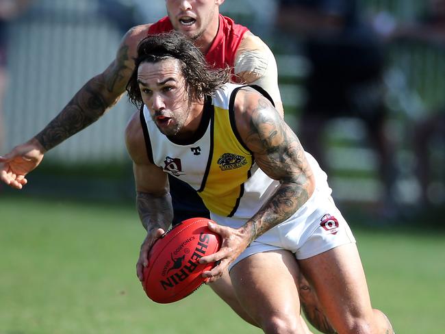 Round 4 QAFL Australian rules game between Surfers Paradise Demons (blue) and Labrador Tigers at Sir Bruce Small Park. Photo of Alex McKay. Photo by Richard Gosling