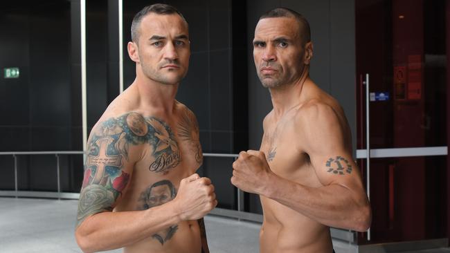 Tommy Browne and Anthony Mundine square off at the weigh-in for the bout. Picture: Simon Bullard