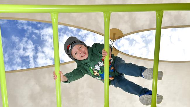 Jonathan Szabo, 4, enjoys the shade at the recently upgraded Bridgnorth Street Park in Carindale. Picture: John Gass