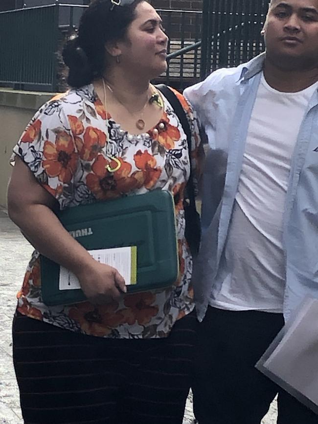 Siosiua Kinahoi, 19, of Burwood with his mother outside Manly Court House. Picture: Jim O'Rourke