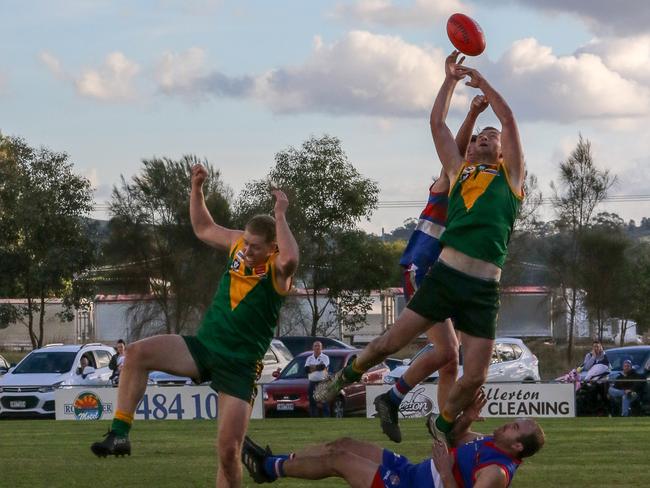 Heathcote District Football League. Round 9 2019. North Bendigo defeated Colbinabbin 8.12 (60) to 6.11 (47). A horizontal Ryan Alford (North Bendigo) is crunched under the pack in a big marking contest. Picture: AARON COOK