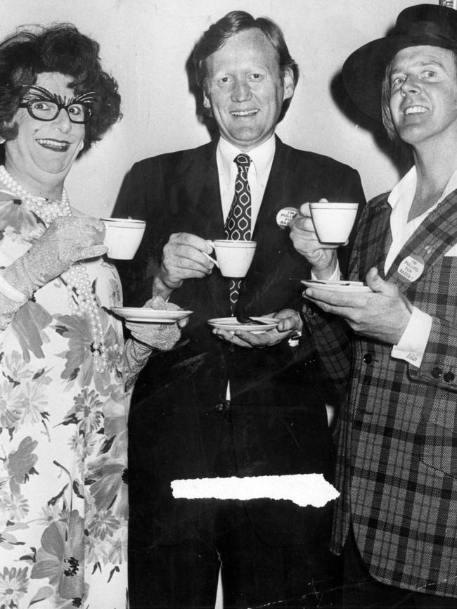 Barry Humphries as Dame Edna Everage, Ron Walker and Barry Crocker at the Melbourne Town Hall.