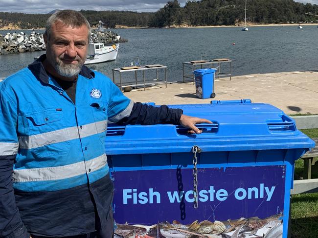 Ocean2earth’s Tim Crane with a dedicated fish waste only bin at an Eden, NSW, boat ramp.