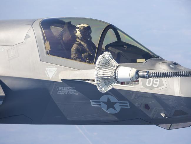 An US Marine F35 jet refuelling mid-air while travelling about 800km/h about 100km south of Darwin. Picture: Floss Adams.