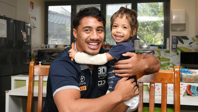 Cowboy Murray Taulagi spreads some joy to young patient Isacc Geia, 3, at Townsville University Hospital as part of a special visit in collaboration with Ronald McDonald House Charities. Picture: Shae Beplate.