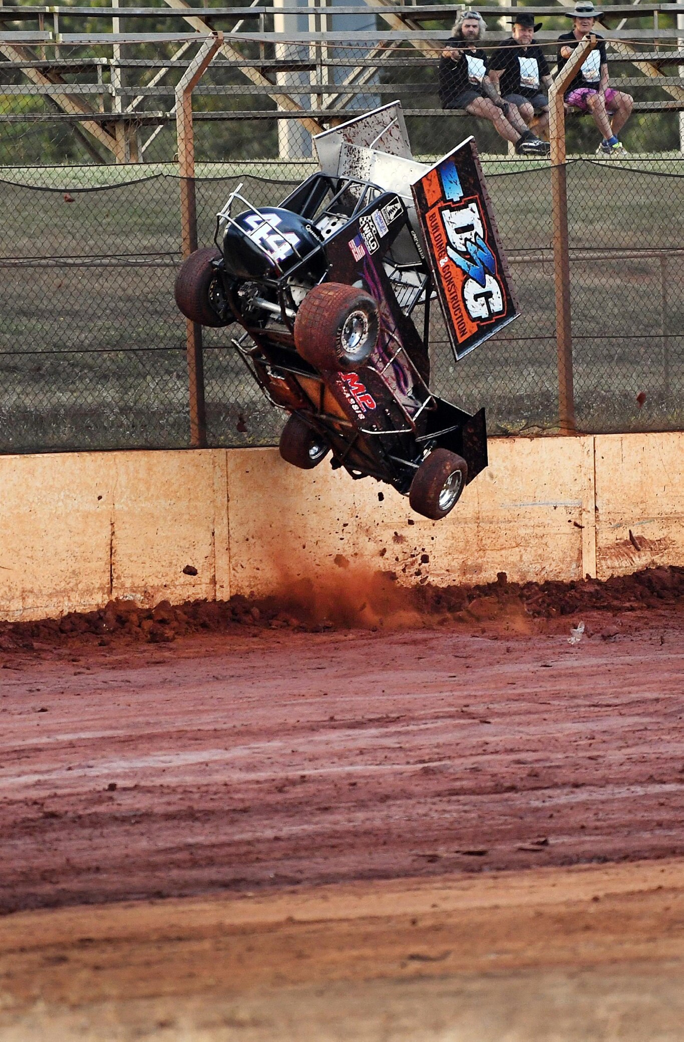 Maryborough Speedway Round 1 - Ken Newton climbs the wall after losing control on the slippery track. Picture: Cody Fox