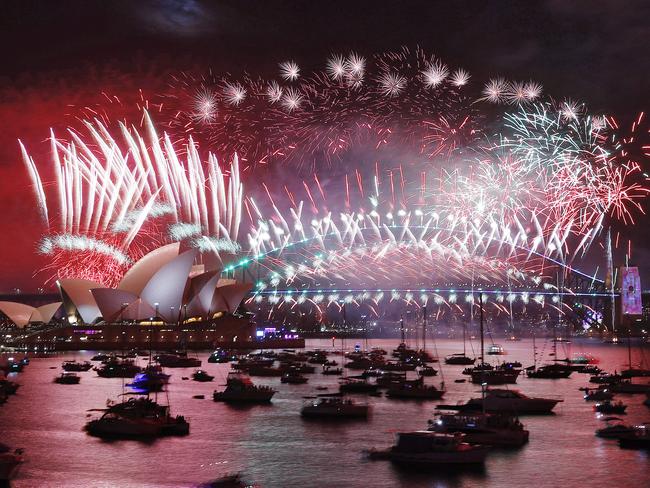 WEEKEND TELEGRAPHS -  31/12/22  MUST CHECK WITH PIC EDITOR JEFF DARMANIN BEFORE PUBLISHING  -NYE 2022 - People from across Sydney and tourists from all over the globe line up to get into Mrs Macquaries Chair to celebrate NYE 2022. Picture: Sam Ruttyn