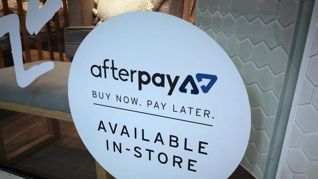 An Afterpay sign is seen in a store window in a shopping centre in Sydney, Tuesday, February 26, 2019. (AAP Image/Derek Rose) NO ARCHIVING