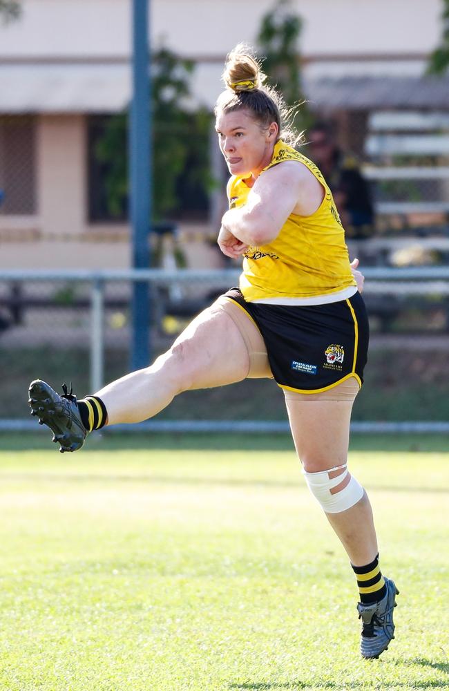 Nightcliff captain Hannah Turnbull boots the ball forward in the 2023-24 NTFL season. Picture: Celina Whan / AFLNT Media