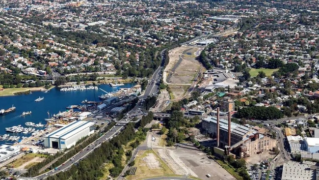 The proposed overpass will see a 15m-wide green link between new parkland at the site of the old Rozelle rail yards and a light rail stop at Rozelle Bay.