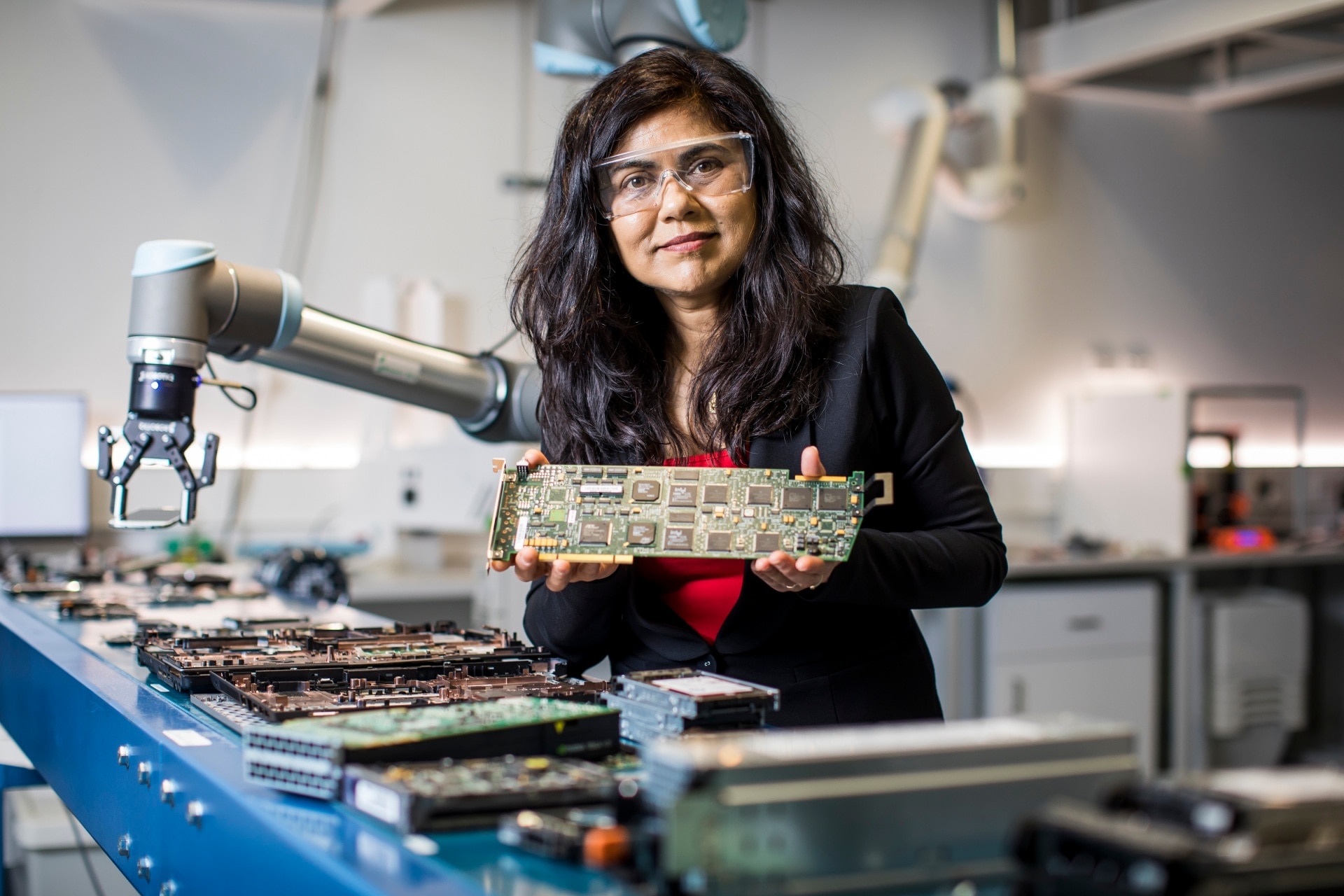 Image credit: Anna Kucera. Professor Veena Sahajwalla working with electronic waste in her  e-waste microfactory.