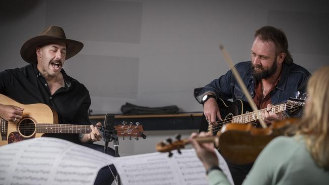 The Tasmanian Symphony Orchestra, The Wolfe Brothers Nick Wolfe, Tom Wolfe and principal second violin Lucy Carrig- Jones. Picture: Chris Kidd