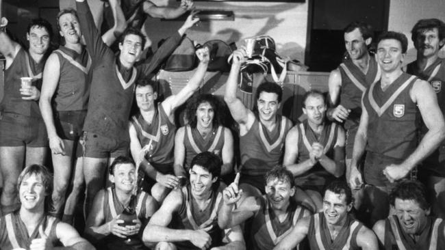 The South Australian team celebrates a win over Victoria in the 1987 State of Origin match at Football Park.