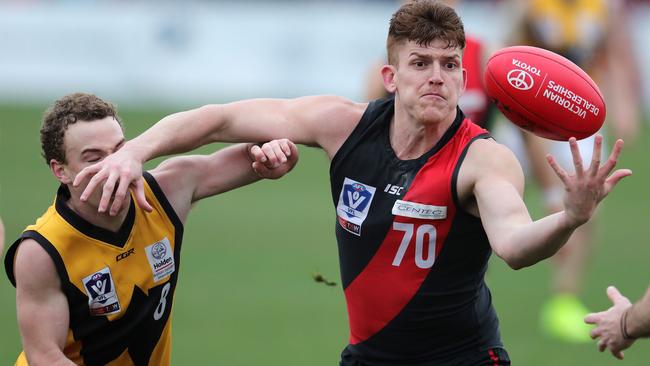 Liam McKenna takes possession of the ball while playing for Essendon in the VFL. Pic: Michael Klein.