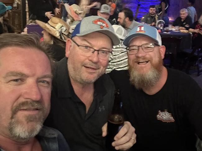 Graham Ashton (centre) living it up in a Fort Worth barbecue joint.