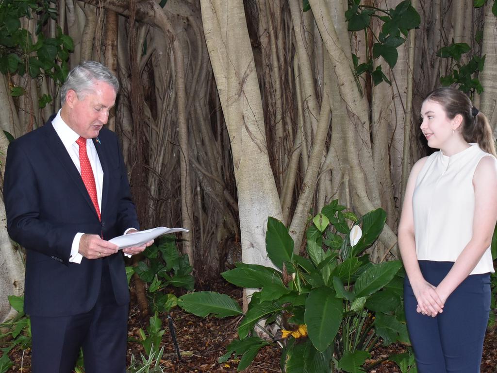 Mackay Mayor Greg Williamson awarded Artspace Mackay’s $1000 Rick Wood bursary for 2022 to Georgia Farlow. Picture: Madeleine Graham
