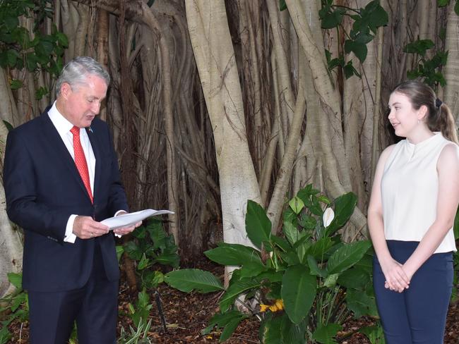 Mackay Mayor Greg Williamson awarded Artspace Mackay’s $1000 Rick Wood bursary for 2022 to Georgia Farlow. Picture: Madeleine Graham