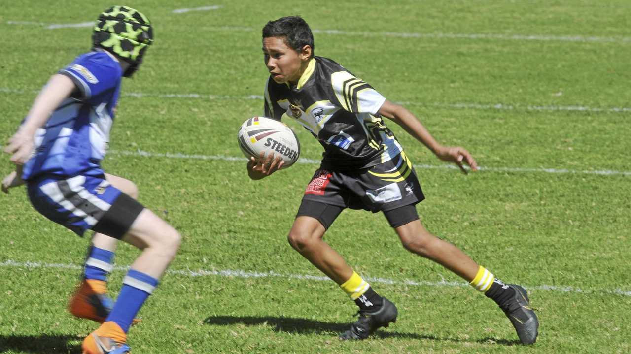 Zakye Swan-Pearce puts in a step in the under-13 Group 1 grand final between the Grafton Ghosts and the Clarence Coast Magpies at Frank McGuren Field on Saturday. Picture: Mitchell Keenan