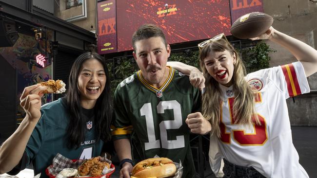 Ronnie Young, 30, Zach Stewart, 31, and Maree Ellard, 30 at The District at SkyCity ahead of Monday's Super Bowl. Picture: Brett Hartwig