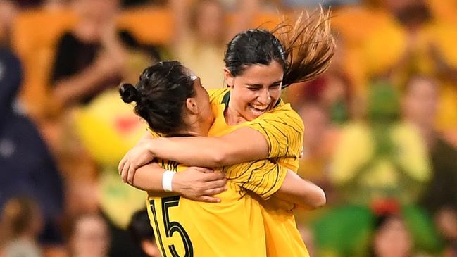 Alex Chidiac hugs Emily Gielnik during the 2019 Cup of Nations match against Korea Republic. Picture: Getty