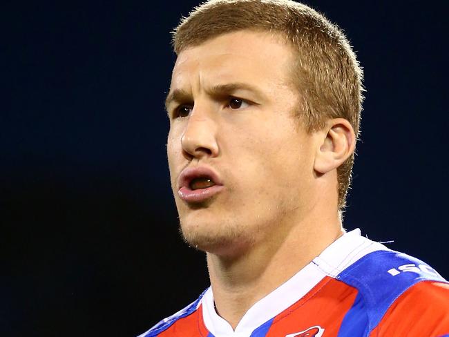 CANBERRA, AUSTRALIA - AUGUST 25:  Trent Hodkinson of the Knights is pictured with 'Hannah' on his forearm taping out of respect for the passing of Hannah Rye during the round 25 NRL match between the Canberra Raiders and the Newcastle Knights at GIO Stadium on August 25, 2017 in Canberra, Australia.  (Photo by Mark Nolan/Getty Images)