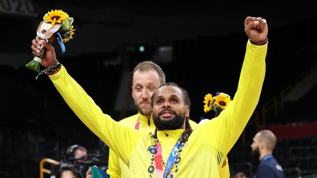 SAITAMA, JAPAN - AUGUST 07: Patty Mills of Team Australia celebrates with his bronze medal during the Men's Basketball medal ceremony on day fifteen of the Tokyo 2020 Olympic Games at Saitama Super Arena on August 07, 2021 in Saitama, Japan. (Photo by Kevin C. Cox/Getty Images)