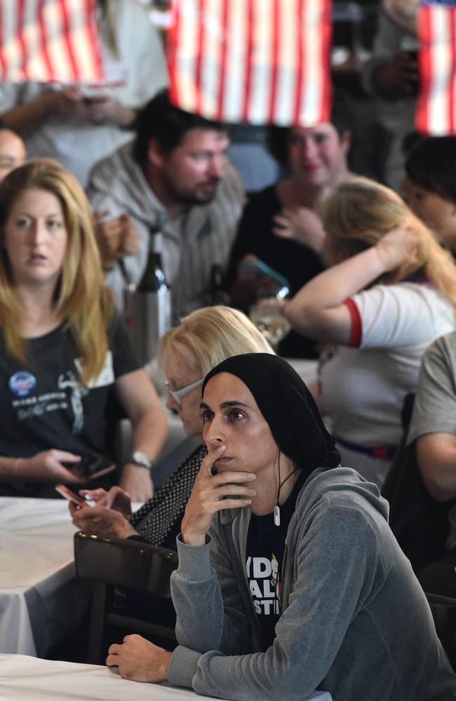 Despondent onlookers at a Democrats abroad function in Melbourne. Picture: Julian Smith/AAP