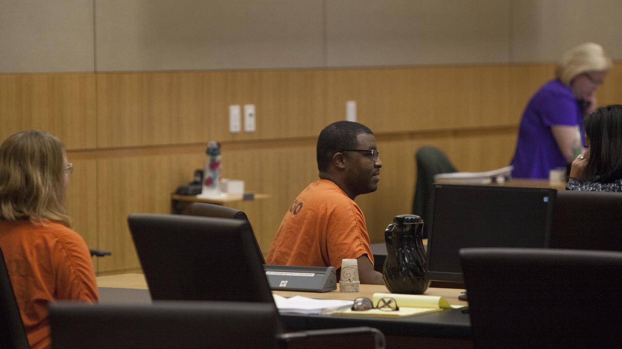 Germayne Cunningham (right) and Lisa Cunningham sit down during a hearing in the murder case of 7-year-old Sanaa Cunningham at the Maricopa County Superior Court in 2018.