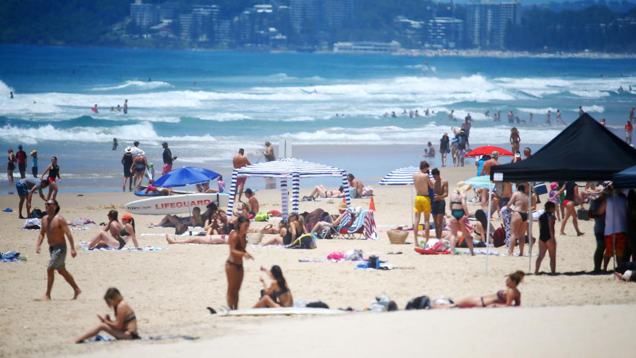 Large crowds packed Gold Coast beaches. Picture: Nigel Hallett.